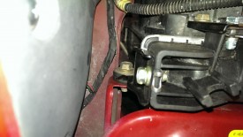 Radiator bolt on the passenger side