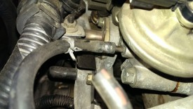Lower EGR vacuum line with hose clamp removed