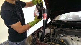 Refilling the coolant with a bugle-sized funnel