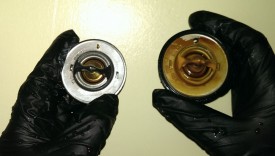 Factory thermostat on left, kit thermostat on right