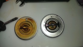 Kit thermostat drilled to 1/8" on left, 1/16" on right