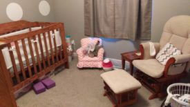 Nursery with crib and table