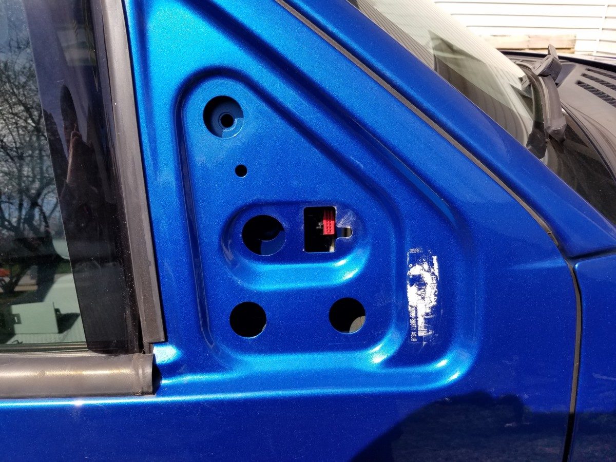 With the mirror finally off, clean around the mirrors weatherstripping and let it dry so it makes a good seal against the body.