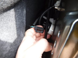 Pinch the tab and pull it out