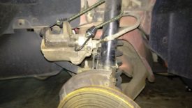 Tie the caliper out of the way