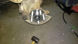 Tap the dust cap back on