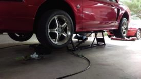 I used a Quickjack, but jack and jack stands work too