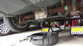 Pan in place to catch oil