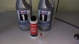 Two quarts of 75W90 and a bottle of Ford Friction Modifier