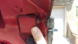 Without the clip, the strut pops off of the trunk