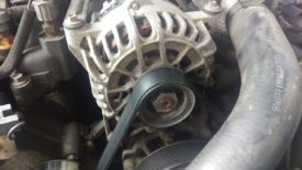 The belt will loosen when the breaker bar is pulled