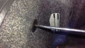Remove the panel by undoing this plastic connector