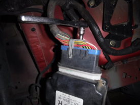 There's a bolt holding this connector in