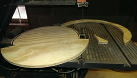 Rough cut the baffle with a bandsaw or jigsaw