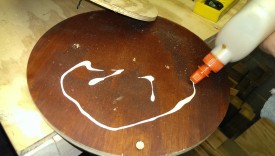 Applying glue to top pieces