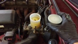 Uncap the master cylinder