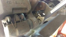 Undo the slider pin with a wrench - a ratcheting box wrench is really helpful here