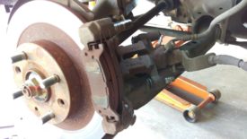 Once lifted up, it can slide off the top pin