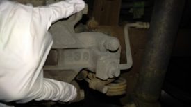 There are two bolts holding each caliper on