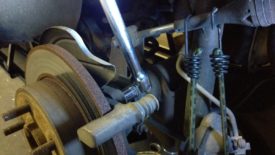 First pad bracket bolt