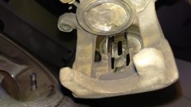 Installing new shim in the caliper