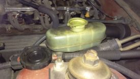 Take the cap off of the brake fluid reservoir