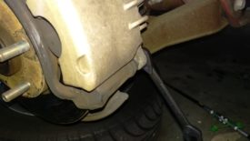 The bottom front caliper bolt