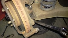 The bottom caliper bracket bolt