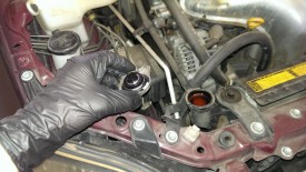 Open radiator fill cap