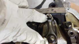 Rod cap on the end of the first piston