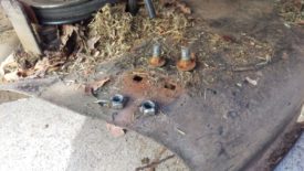 The deflector is attached with the two bolts pictured