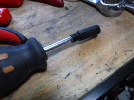 A thick screw driver stretched the plastic enough to fit