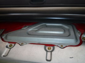 Covers the fuel tank and pump