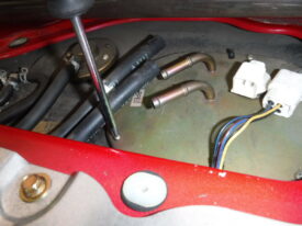 These phillips head screws hold the fuel pump to the tank