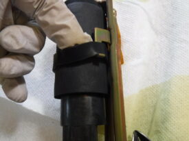 Slide the strap thingy down
