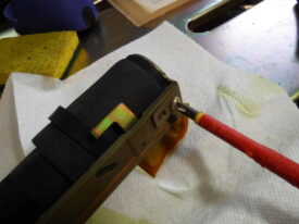Final screw holding the fuel pump on