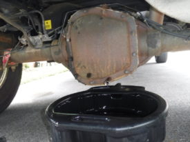 Get your drain pan and start cracking all of the bolts loose