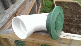 Pop-up emitter with an elbow adapter