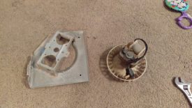 Remove 2 nuts and pull fan from bracket