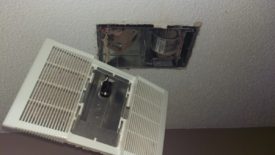 Far shot, the cover is still hanging by the light bulb