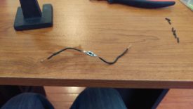 Soldering leads on either end of the switch