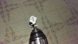 Drilling out a new hole in the holder