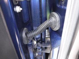 The conduit between the door and truck body