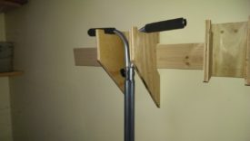 Closeup of reel mower holder