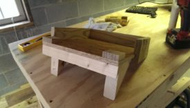 Shelf surface with little wood blocks to act as screw anchors