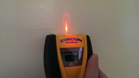 A stud finder can be used to determine where to place the screws