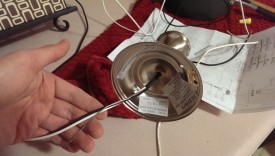 The fixture has hot, neutral, and ground wires