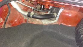 There's a panel in the trunk to remove, which no longer existed in my car