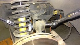 Undo the knuckle/spindle/whatever bolt