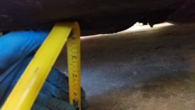 Checking the ride height at the pinch weld